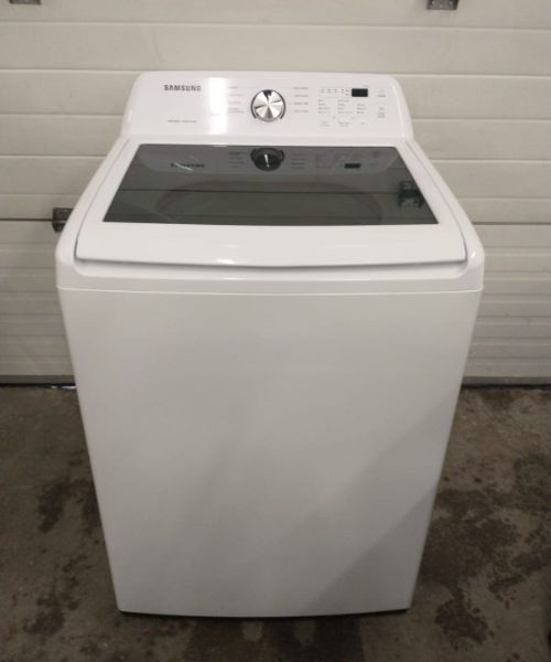 white washing machine newly repaired