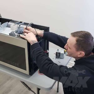 technician repair over the range microwave