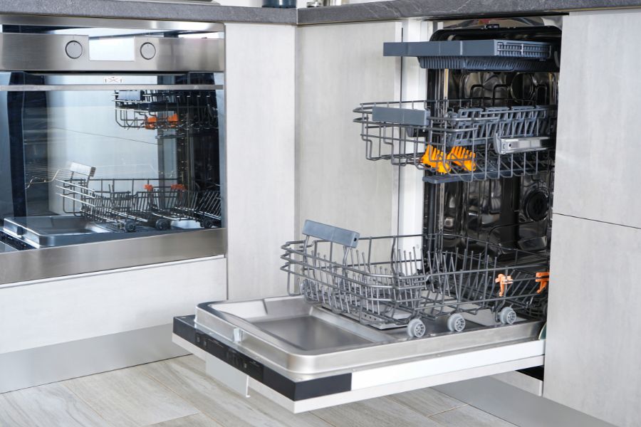 Why is my dishwasher not draining completely after cycle